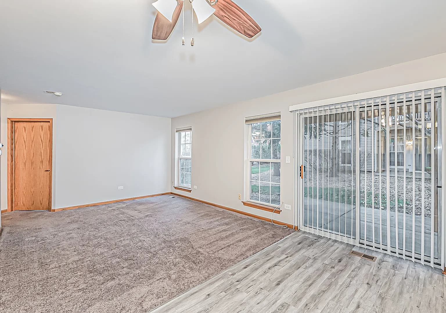 Bright living room with sliding doors opening to the patio