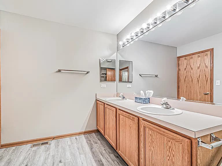 Dual-sink bathroom vanity with full-width mirror